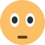 An emoji of a yellow face with a shocked expression.