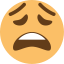 An emoji of a yellow face with a frustrated expression.