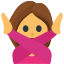 An emoji of a girl with brown hair with her arms crossed in front of her.