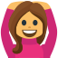 An emoji of a girl with brown hair with her hands raised above her head.