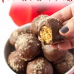 A hand holding a bitten chocolate peanut butter ball.  Overlay text at top of image.