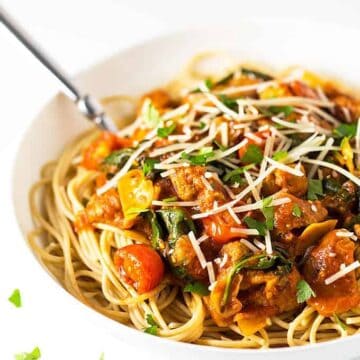 Turkey Sausage Spaghetti - A healthier spaghetti recipe with Italian turkey sausage, mushrooms, artichoke hearts and spinach served over whole wheat spaghetti noodles.
