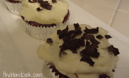 Red Velvet Cupcakes on a white platter.