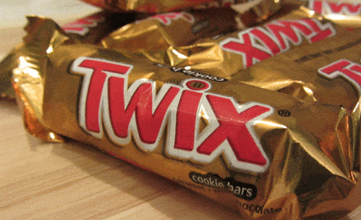 Closeup of snack size Twix candy bars in their wrappers.