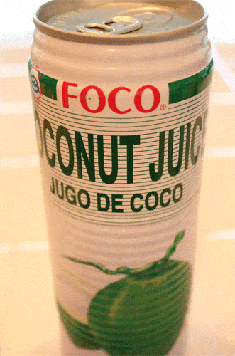 A closeup of a can of coconut juice.