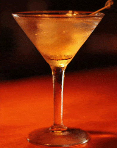 A martini on a dark background.