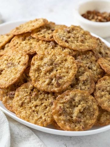 Oatmeal Lace Cookies on a white oval serving platter