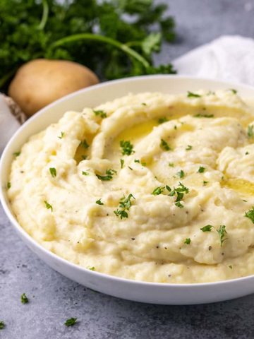 Cream cheese mashed potatoes in a white bowl