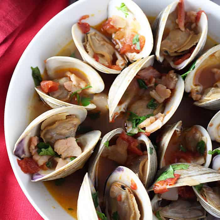 Clams with Smoky Bacon and Tomatoes