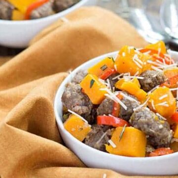 Sausage & Butternut Squash Skillet - Italian sausage, butternut squash, herbs and cheese come together in this fall-inspired skillet dinner!