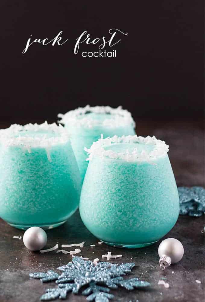 Jack Frost Cocktail - Vodka, pineapple juice, blue curacao and cream of coconut create the most delicious, beautiful and festive holiday cocktail!