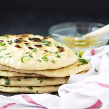 Homemade Naan is easier than you think! Soft, buttery and puffy Indian flatbread recipe | theblondcook.com