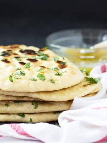 Homemade Naan is easier than you think! Soft, buttery and puffy Indian flatbread recipe | theblondcook.com