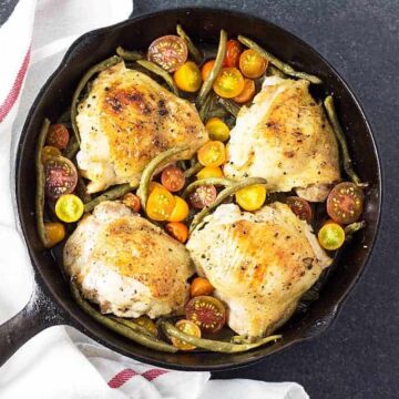 ONE PAN Roasted Chicken with Lemon Herb Green Beans and Tomatoes - Just an hour for the most savory and flavorful low carb chicken dish!