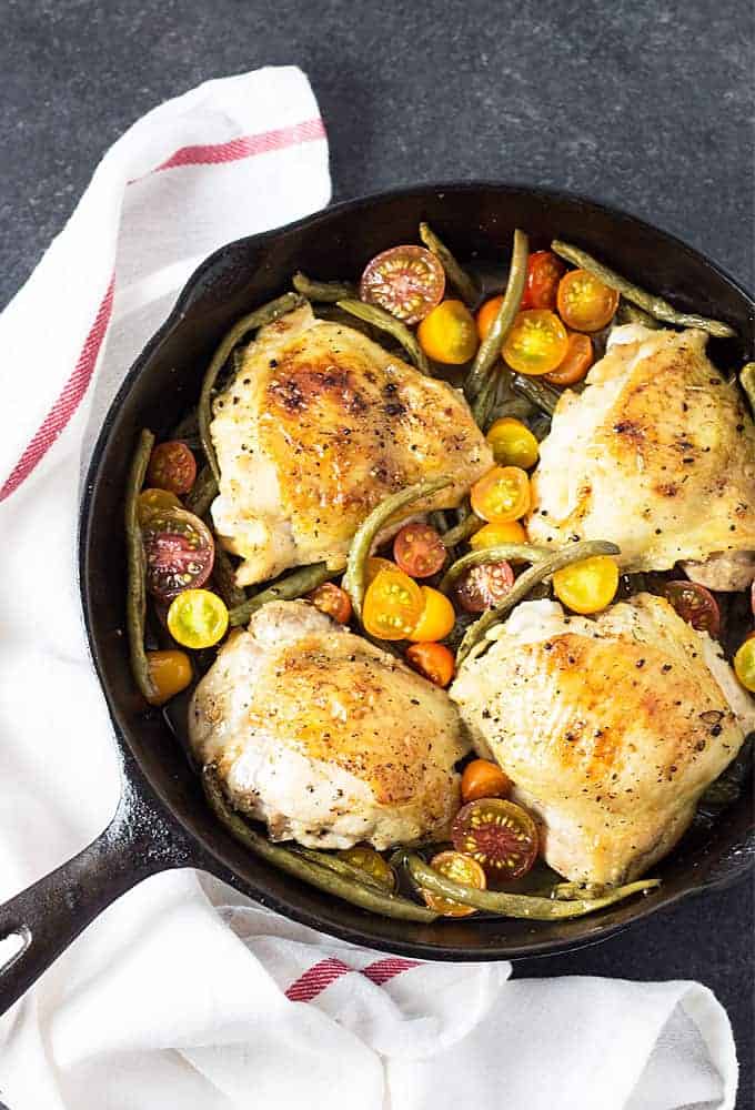 ONE PAN Roasted Chicken with Lemon Herb Green Beans and Tomatoes - Just an hour for the most savory and flavorful low carb chicken dish!