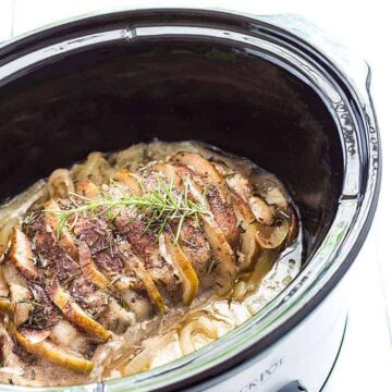 Apple Rosemary Pork Loin in an oval slow cooker