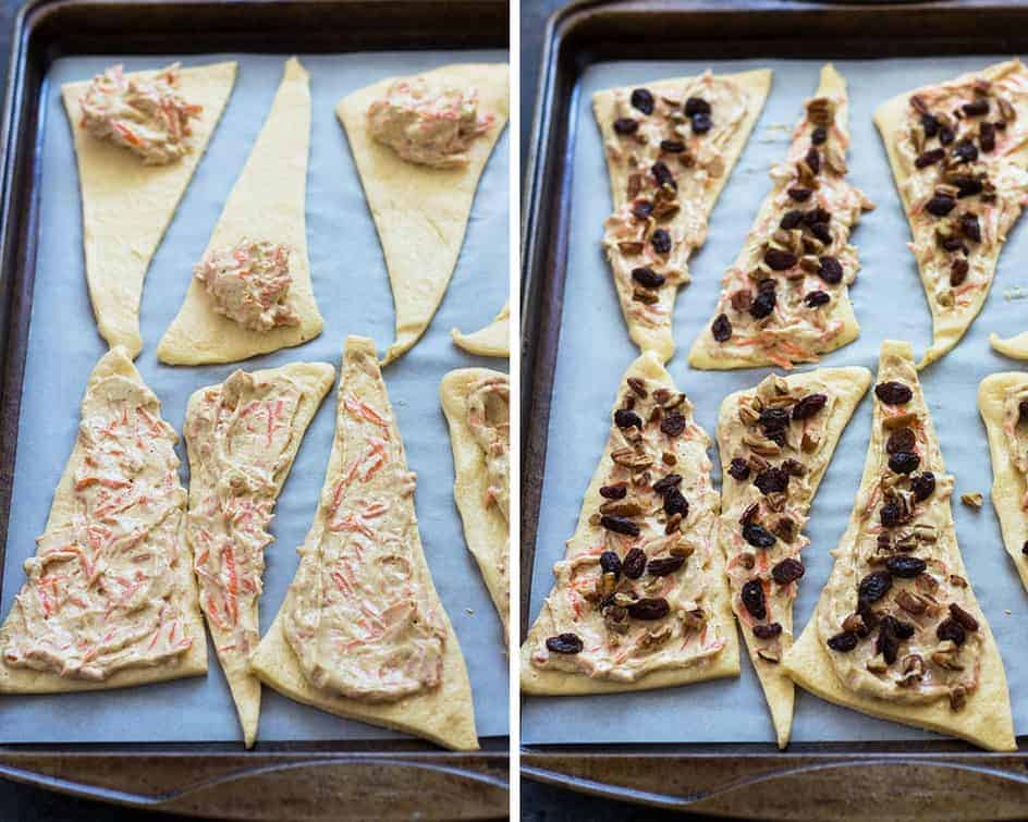 Crescent roll triangles spread with a carrot cream cheese mixture and topped with raisins.