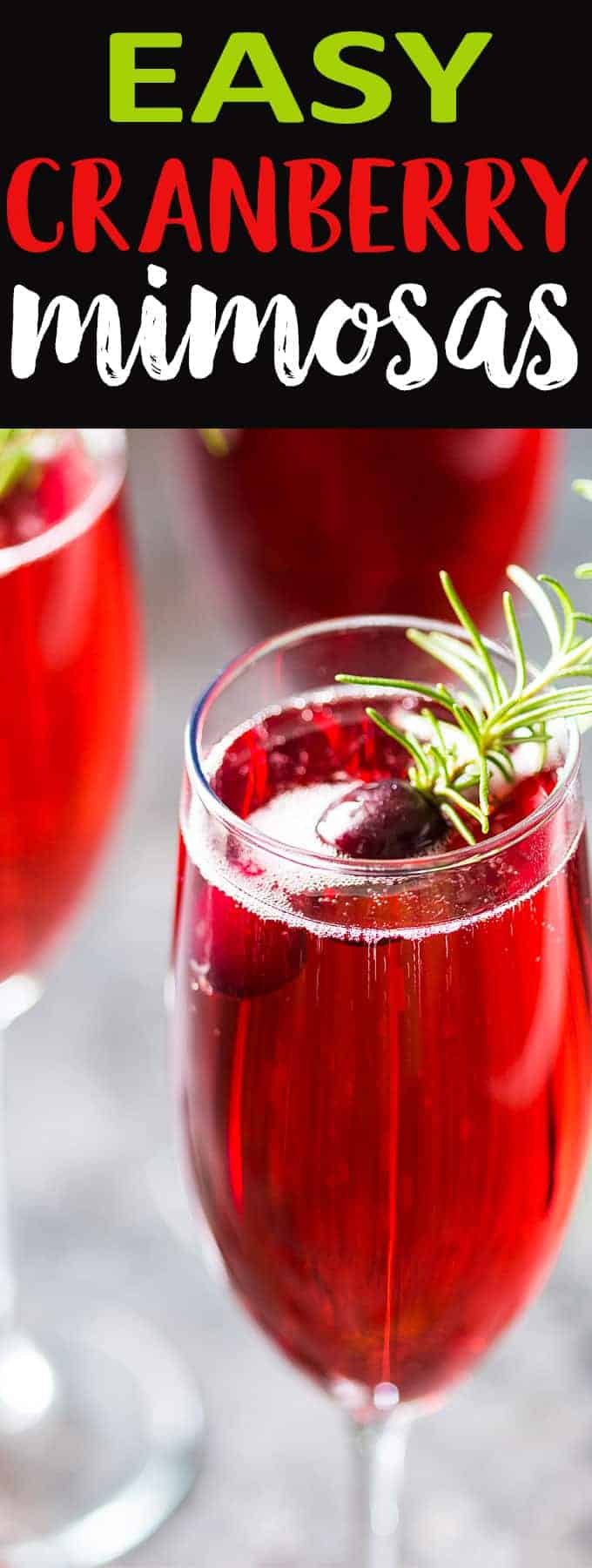 Front closeup view of a cranberry mimosa garnished with a fresh rosemary sprig.