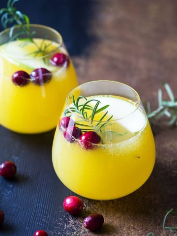 Champagne Sangria - A sweet, savory and tart sangria with rosemary simple syrup.