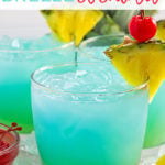 Three blue and green cocktails garnished with pineapple and cherries with overlay text.