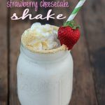 A milkshake cocktail in a jar with whipped topping and a strawberry with overlay text.