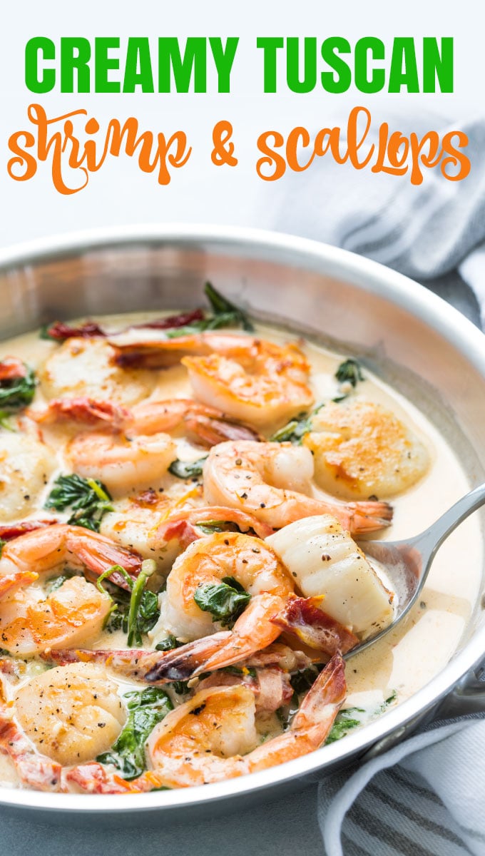 A spoon in a skillet of creamy Tuscan shrimp and scallops with overlay text.