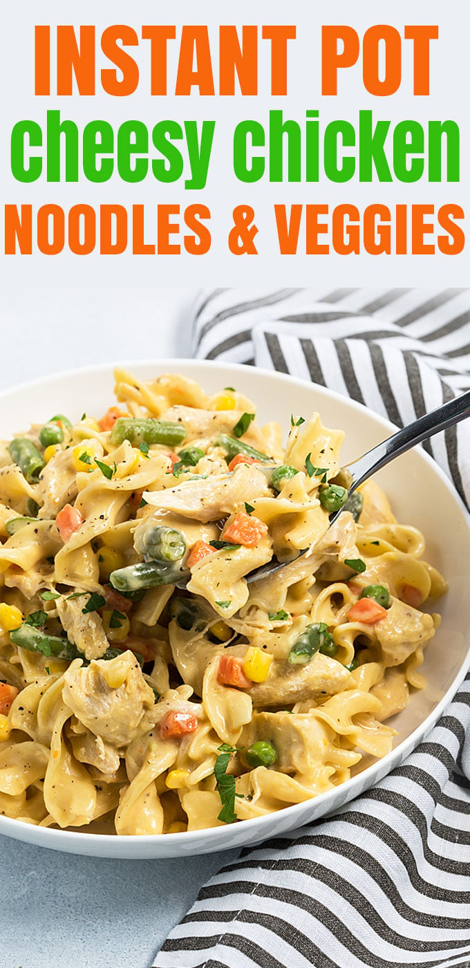 A bowl of cheesy noodles, chicken and vegetables.  Overlay text at top of image.