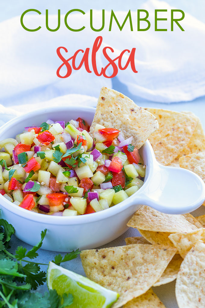 A tortilla chip in a white bowl of cucumber tomato salsa.  Text at top of image.