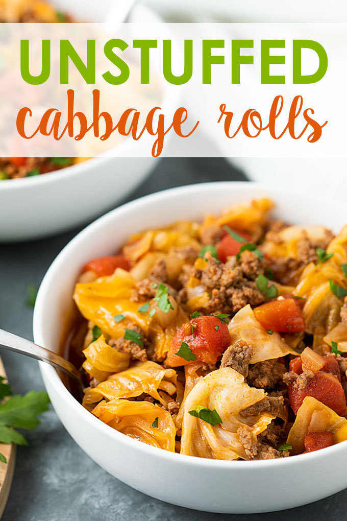 Unstuffed Cabbage Rolls in 2 white bowls with spoons and topped with parsley.
