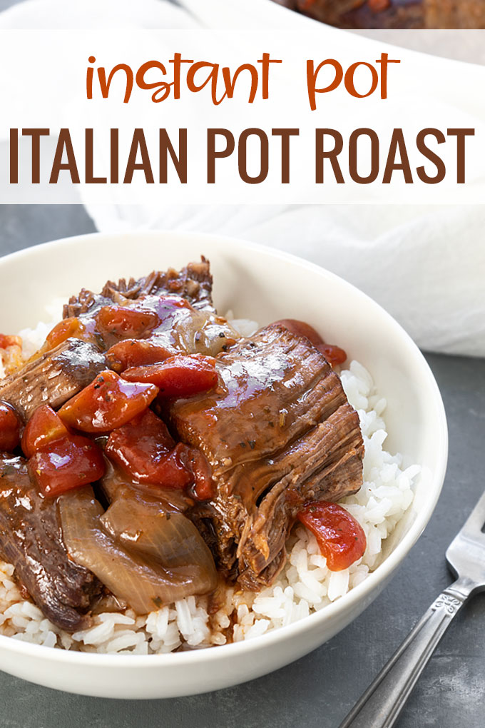 Pot roast with tomatoes and onions over rice in a white bowl by a fork.