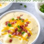 Potato soup in a white bowl with overlay text.