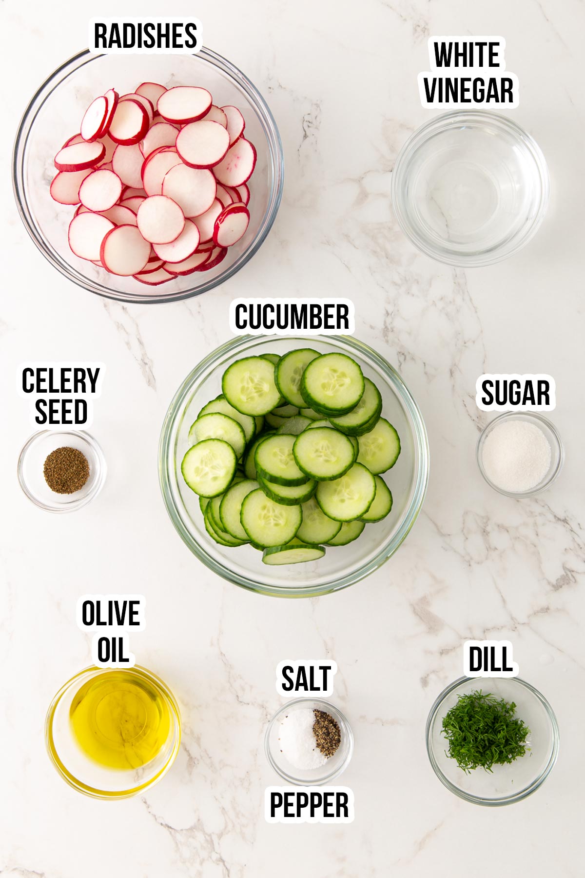 Overhead view of ingredients for cucumber radish salad with overlay text.
