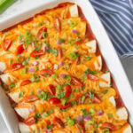Shredded beef enchiladas in a white baking dish with overlay text.