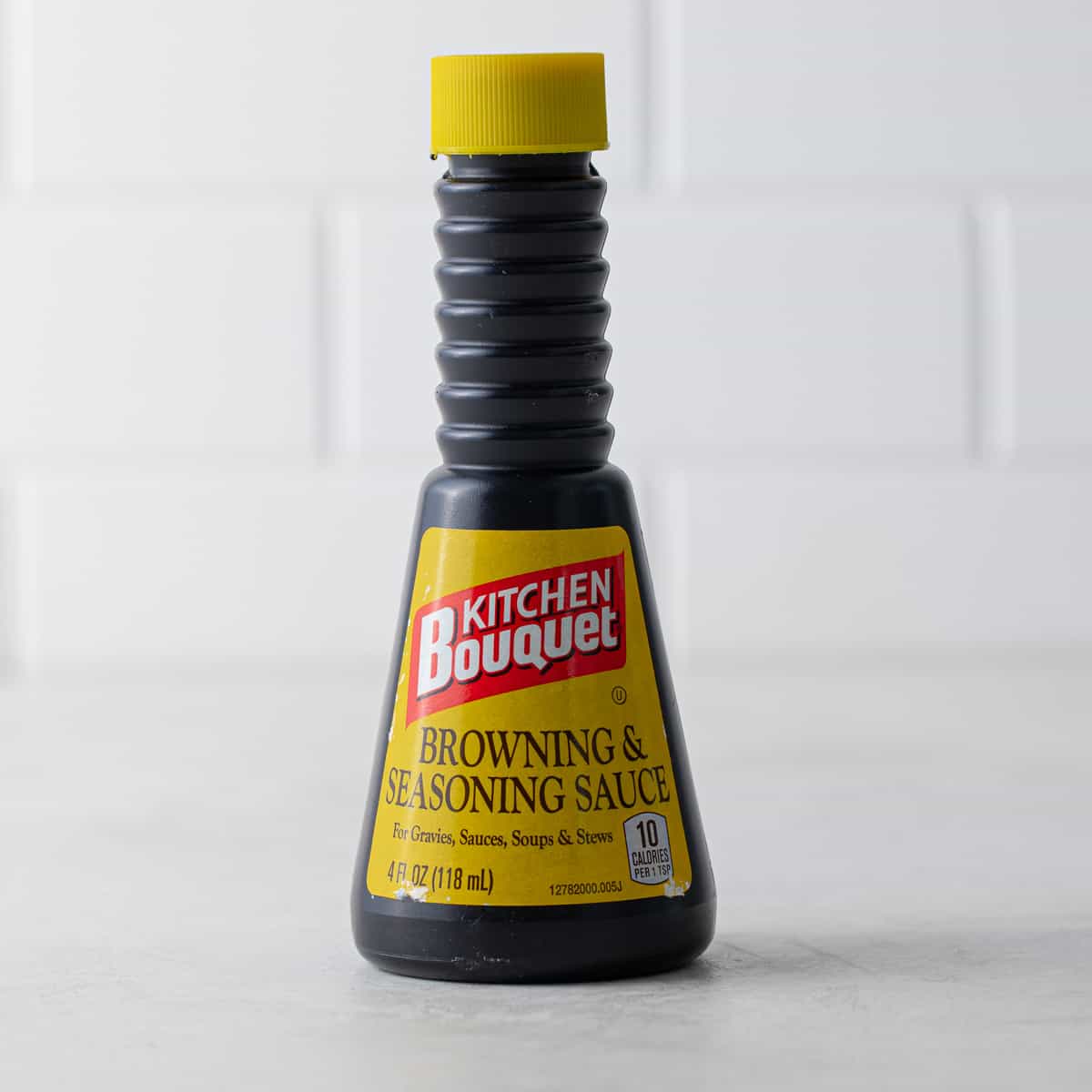 Front view of a bottle of Kitchen Bouquet browning sauce.