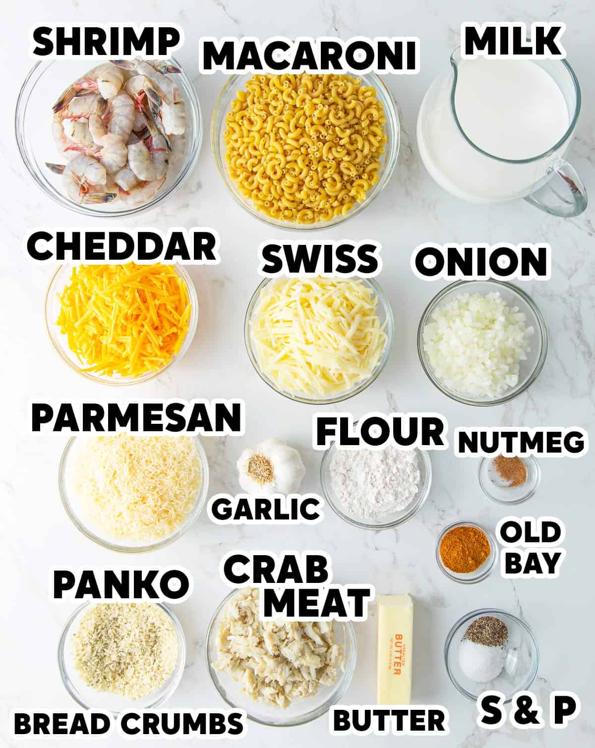 Overhead view of ingredients needed for seafood mac and cheese with overlay text.