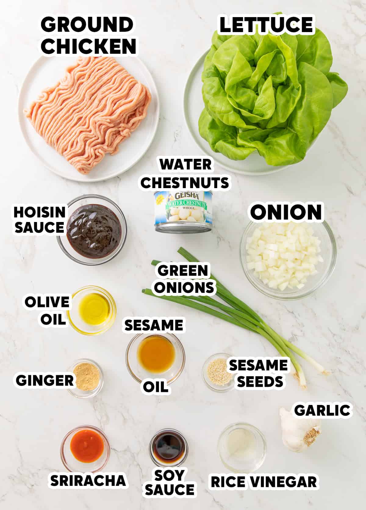 Overhead view of ingredients for Asian chicken lettuce wraps with overlay text.