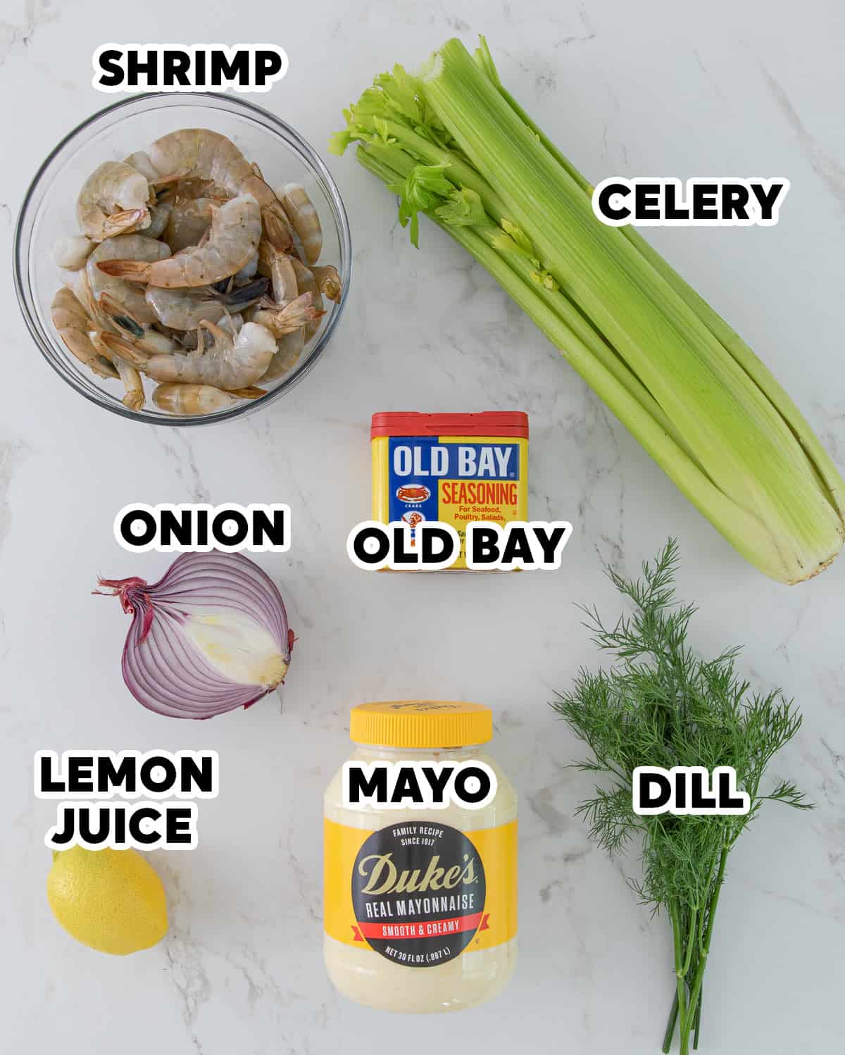 Overhead view of ingredients for shrimp salad with overlay text.