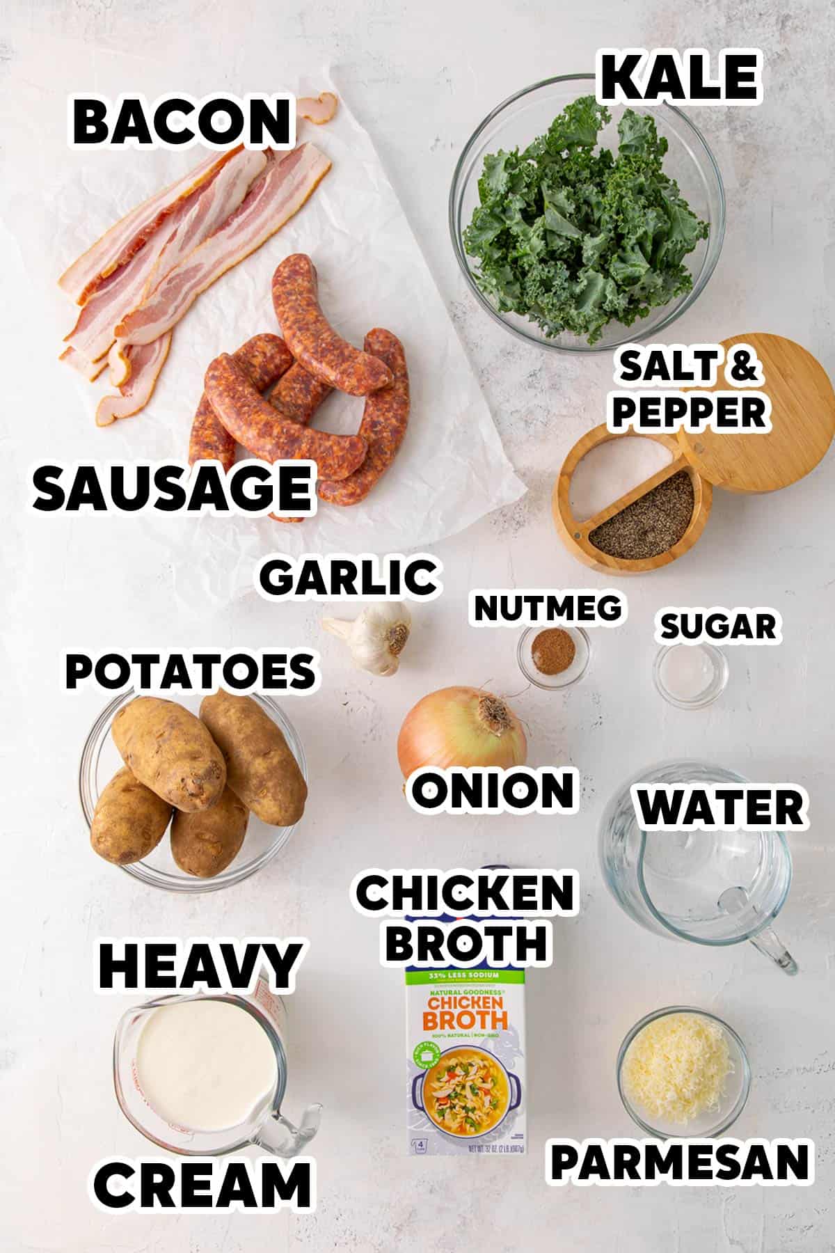 Overhead view of ingredients for making Crock Pot Zuppa Toscana with overlay text.