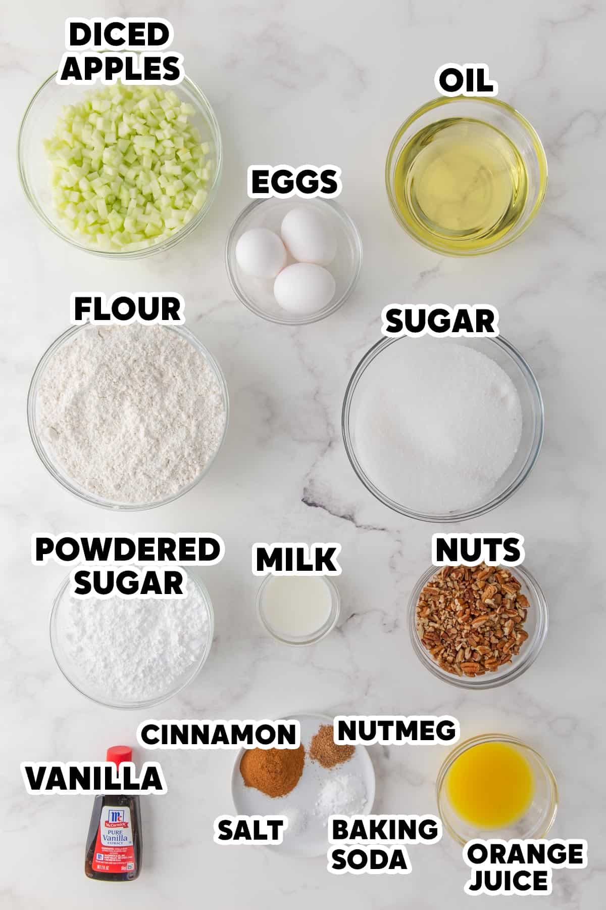 Overhead view of ingredients for making an apple nut cake with overlay text.