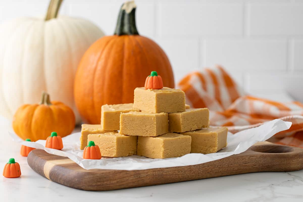 Front view of a stack of pumpkin fudge squares.