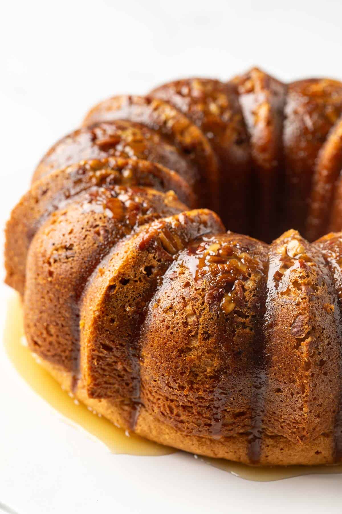 Front angled view of a Bacardi rum cake with rum glaze.