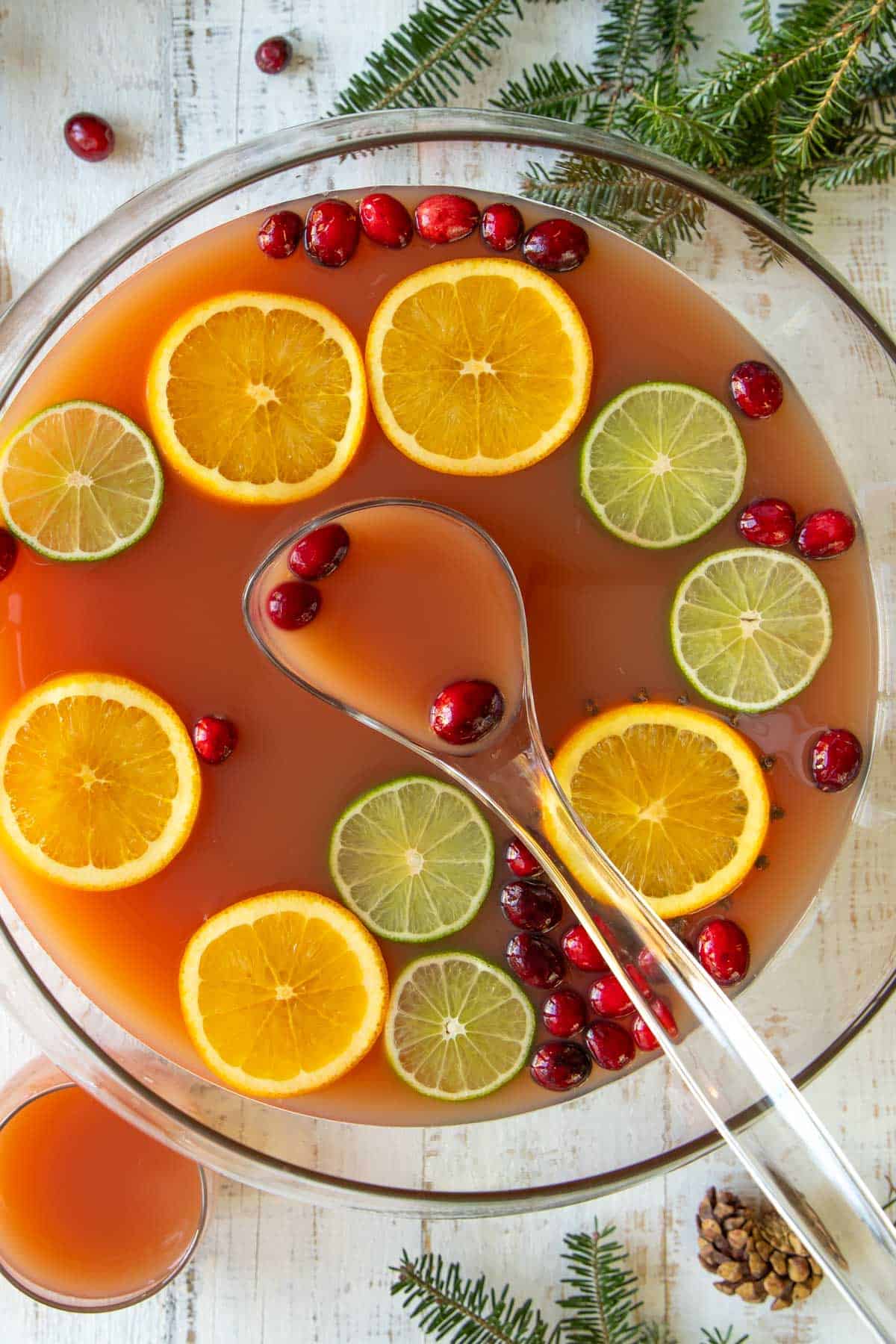 Overhead view of Christmas punch in a punch bowl with a ladle.
