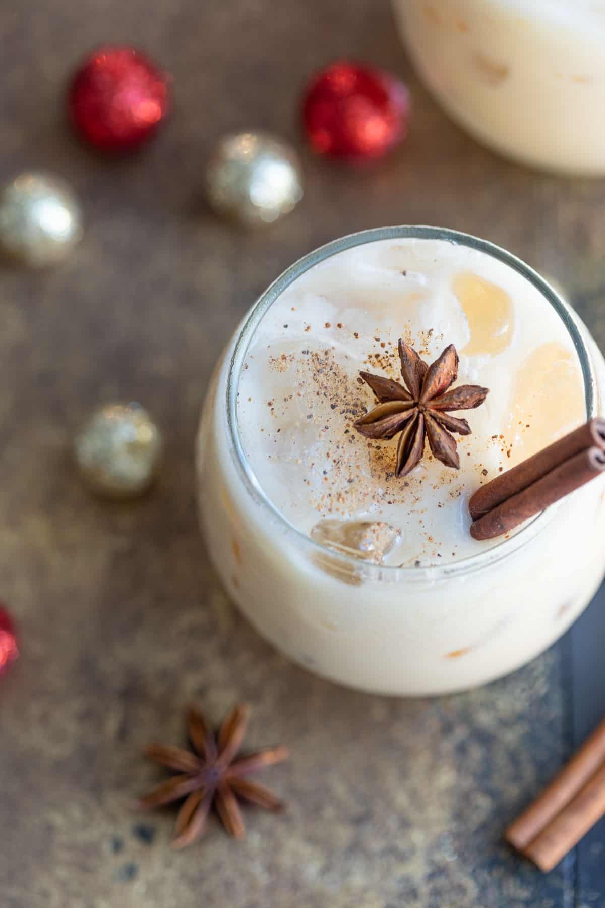 Overhead view of a garnished eggnog white Russian cocktail.