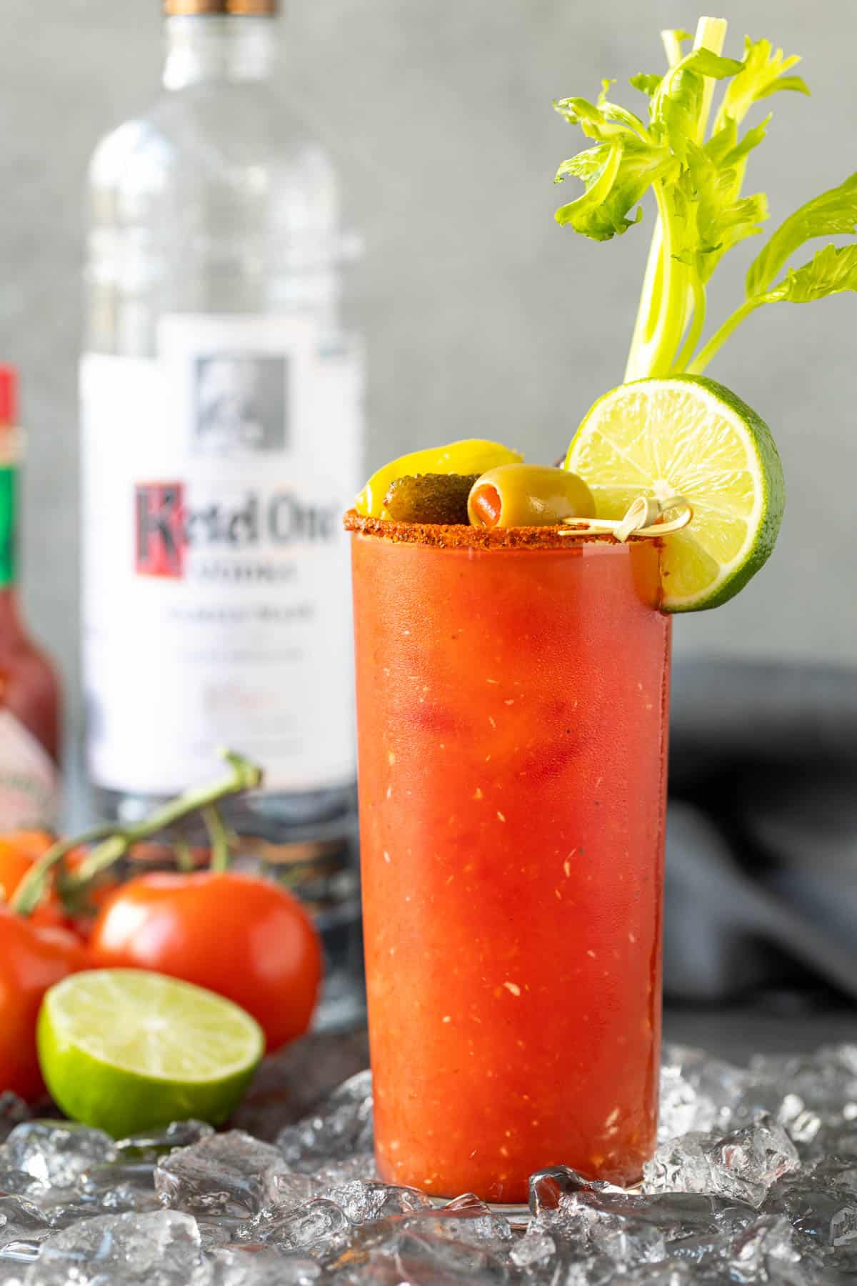 Front view of a garnished bloody mary cocktail.
