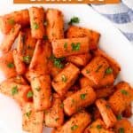 Overhead close up of air fryer carrots on a white plate. Overlay text is at the top of the image.